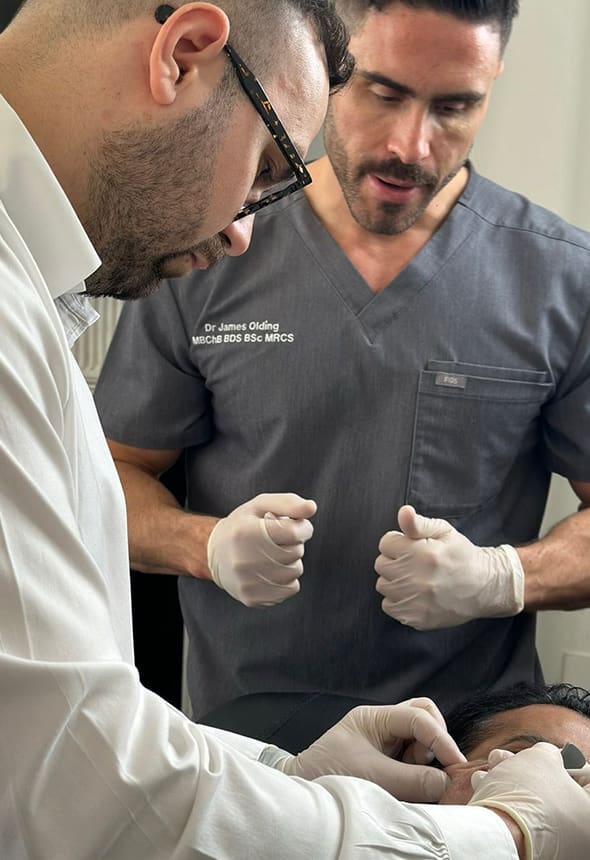 James Olding teaching tear trough filler techniques to an advanced injector in Manchester.